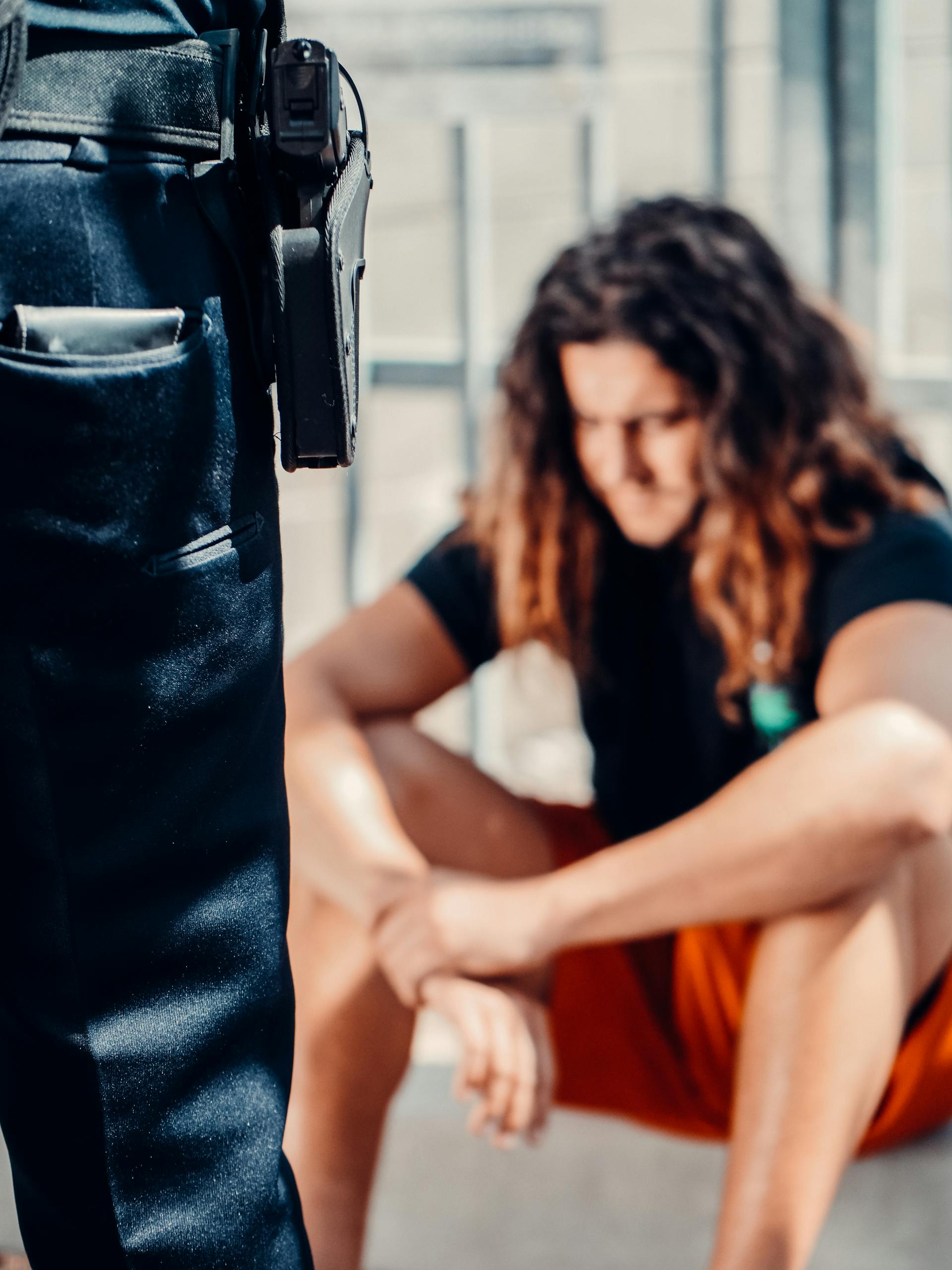 Woman in Black Leather Sleeveless Dress