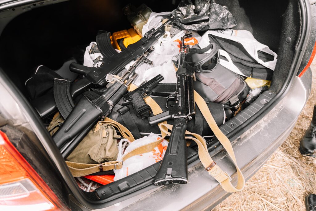 Selling illegal weapons from the boot of a car Selling illegal weapons from the boot of a car