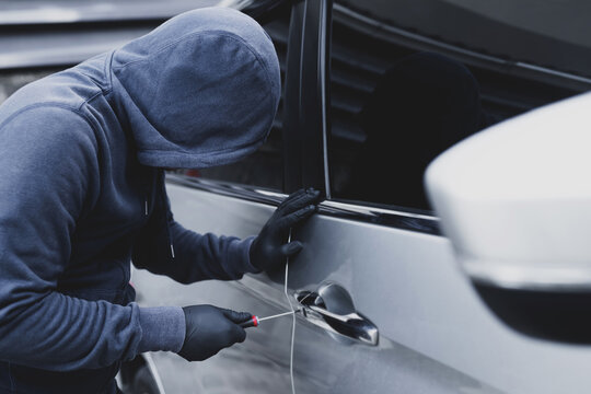 Man attempting to break into a car - theft - theft charge