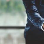 Business handshake | EAS Legal