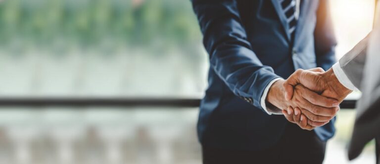 Business handshake | EAS Legal